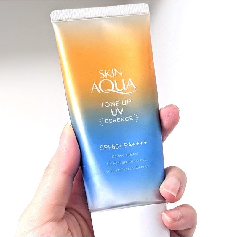 Skin Aqua Tone Up UV Essence Tinted Sunscreen Latte Beige SPF50+ PA++++ (80g)
